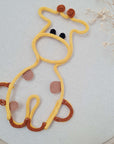 Knitted tube giraffe