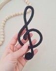 Knitted tube music note