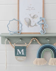 Underwater motifs from knitted tubing - shells and seahorses
