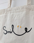 Sac fourre-tout "Smile" avec yeux brodés