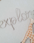 Buy It Now: "explore" lettering in beige