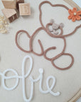 Knitted bear/teddy, with flower or bow accessory