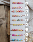 Bracelet «Maman» avec perles colorées