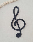 Knitted tube music note
