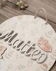 Desired colors: Wooden sign with rainbow and plotted name