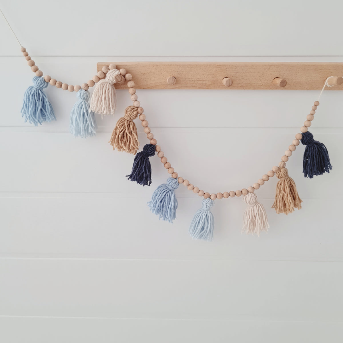 Garland with tassels in blue and brown