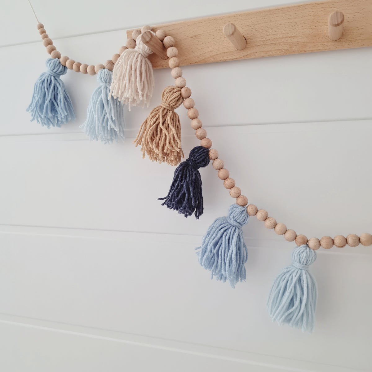 Garland with tassels in blue and brown