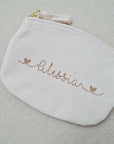 Small toiletry bag with gold lettering