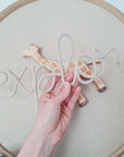 Buy It Now: "explore" lettering in beige