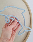 Dolphin made from knitted tubing