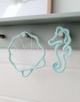Motifs sous-marins en tricot tubulaire – coquillages et hippocampes