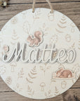 Desired colors: Wooden sign with rainbow and plotted name